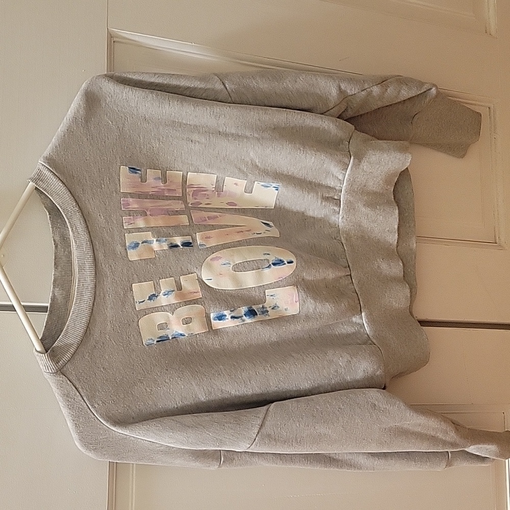 Old Navy women's gray sweatshirt. Size XS. Gently worn. Says "Be the love".